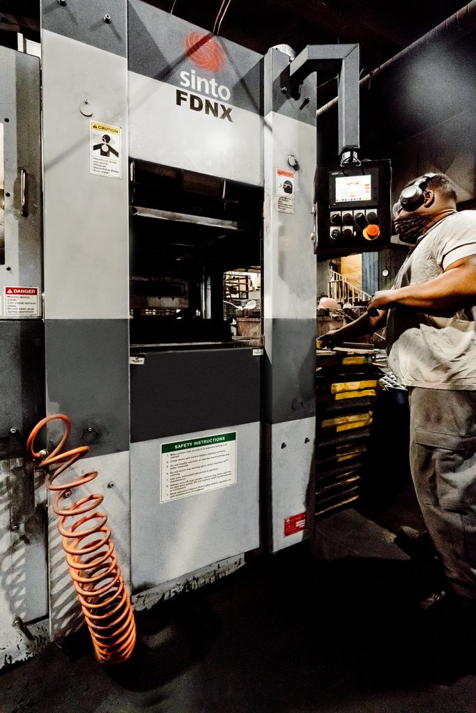 Technician working on the Sinto FDNX