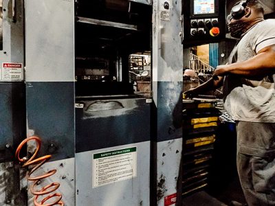 ERMAK technician working the Sinto FDNX at Ermak Foundry